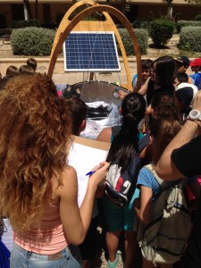 And the kids checking out solar powered cooking